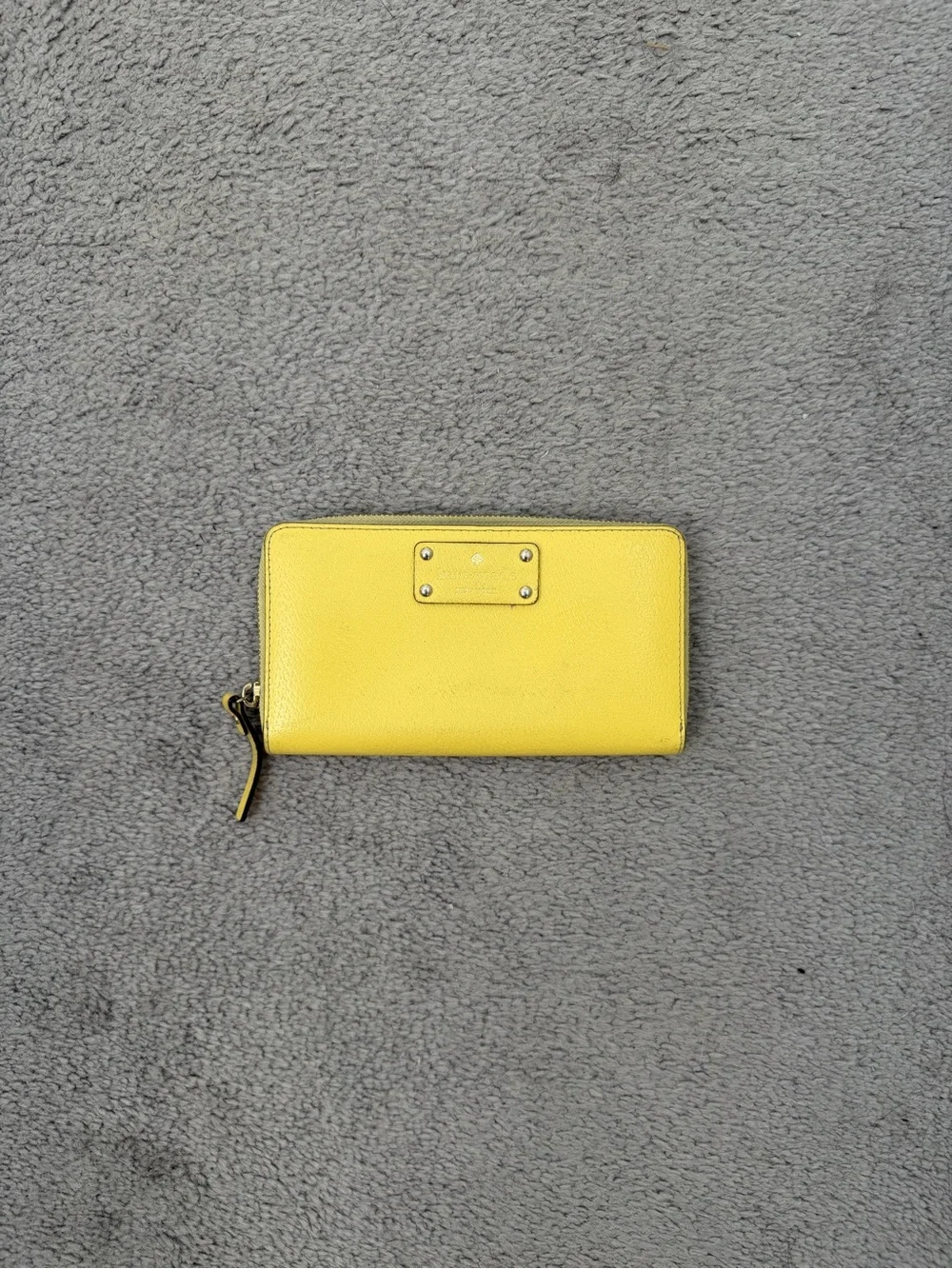 kate spade bright yellow zip-around wallet